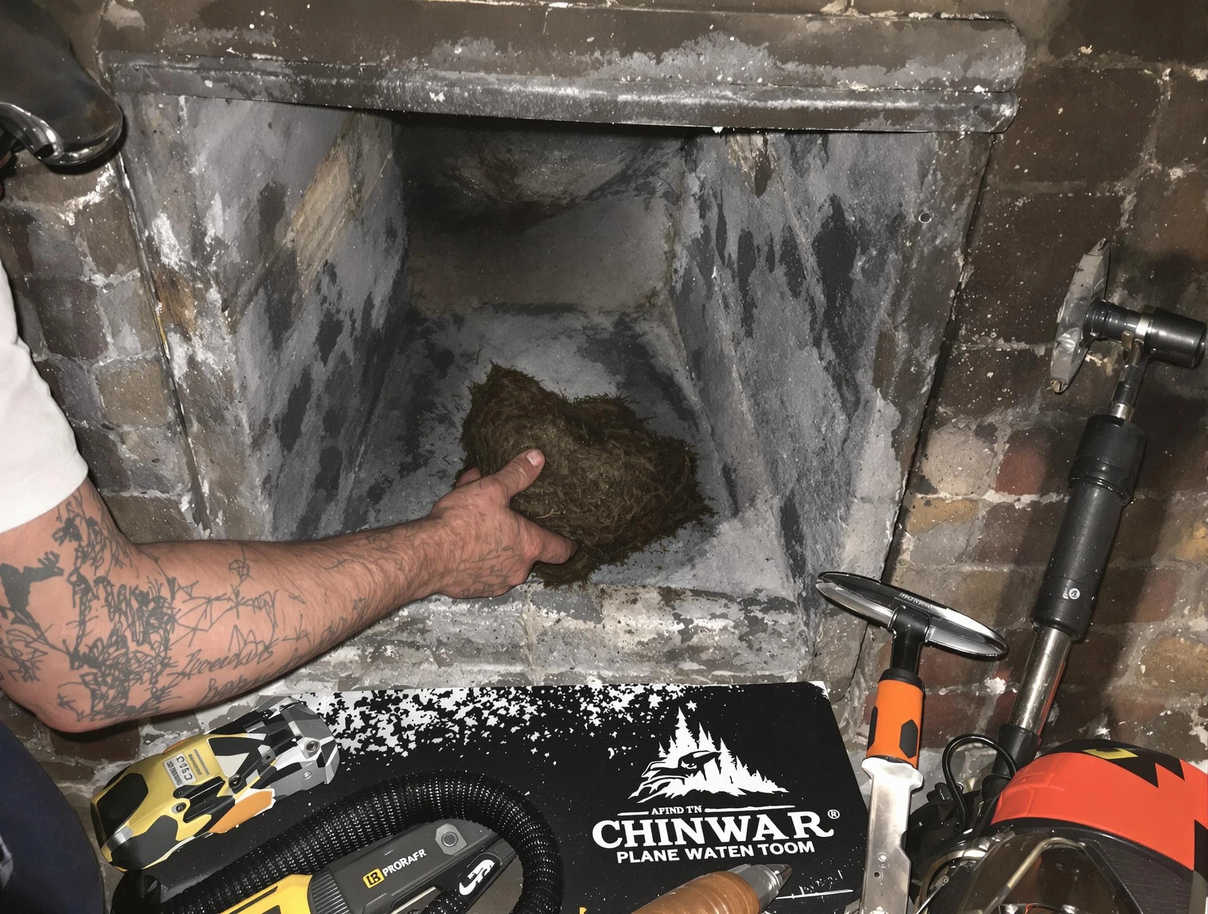 Surprise Chimney Sweep safely removing debris and screening chimney in Surprise, AZ