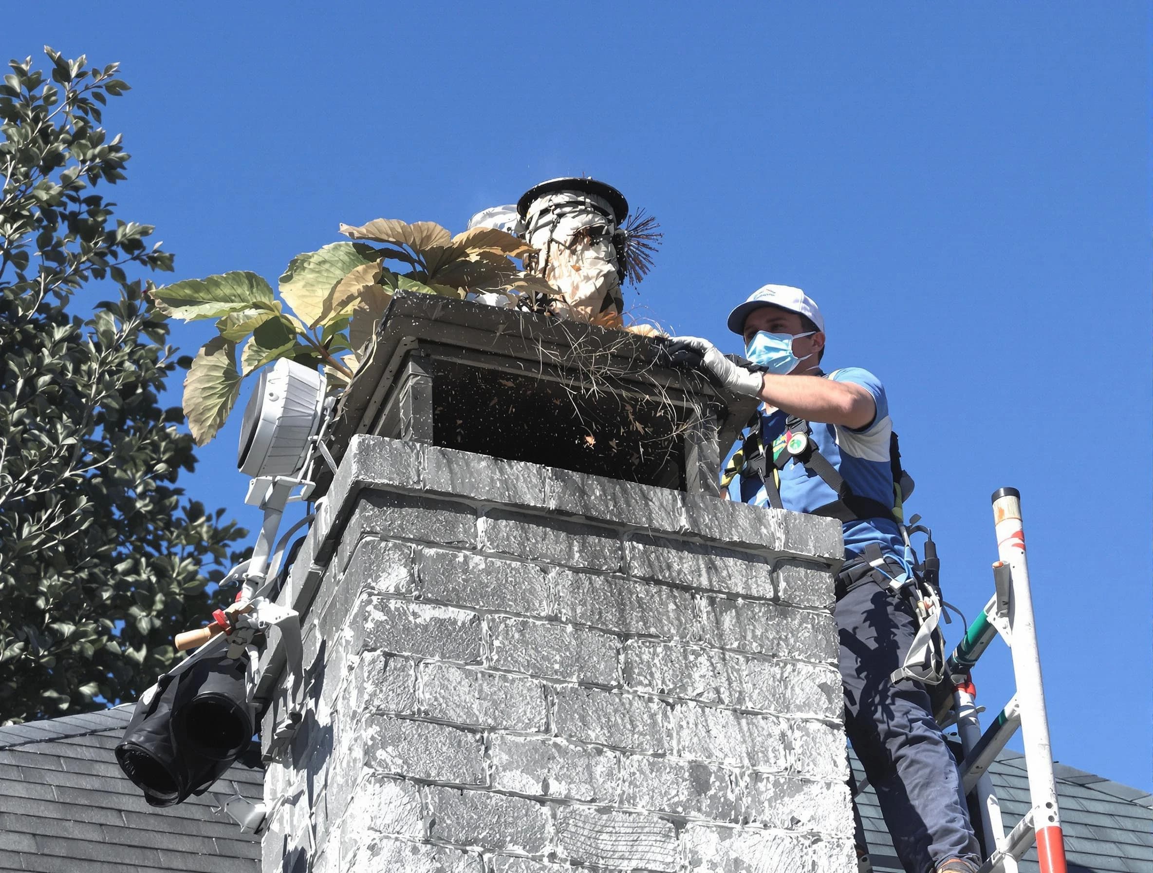 Surprise Chimney Sweep specialist performing chimney cleaning in Surprise, AZ