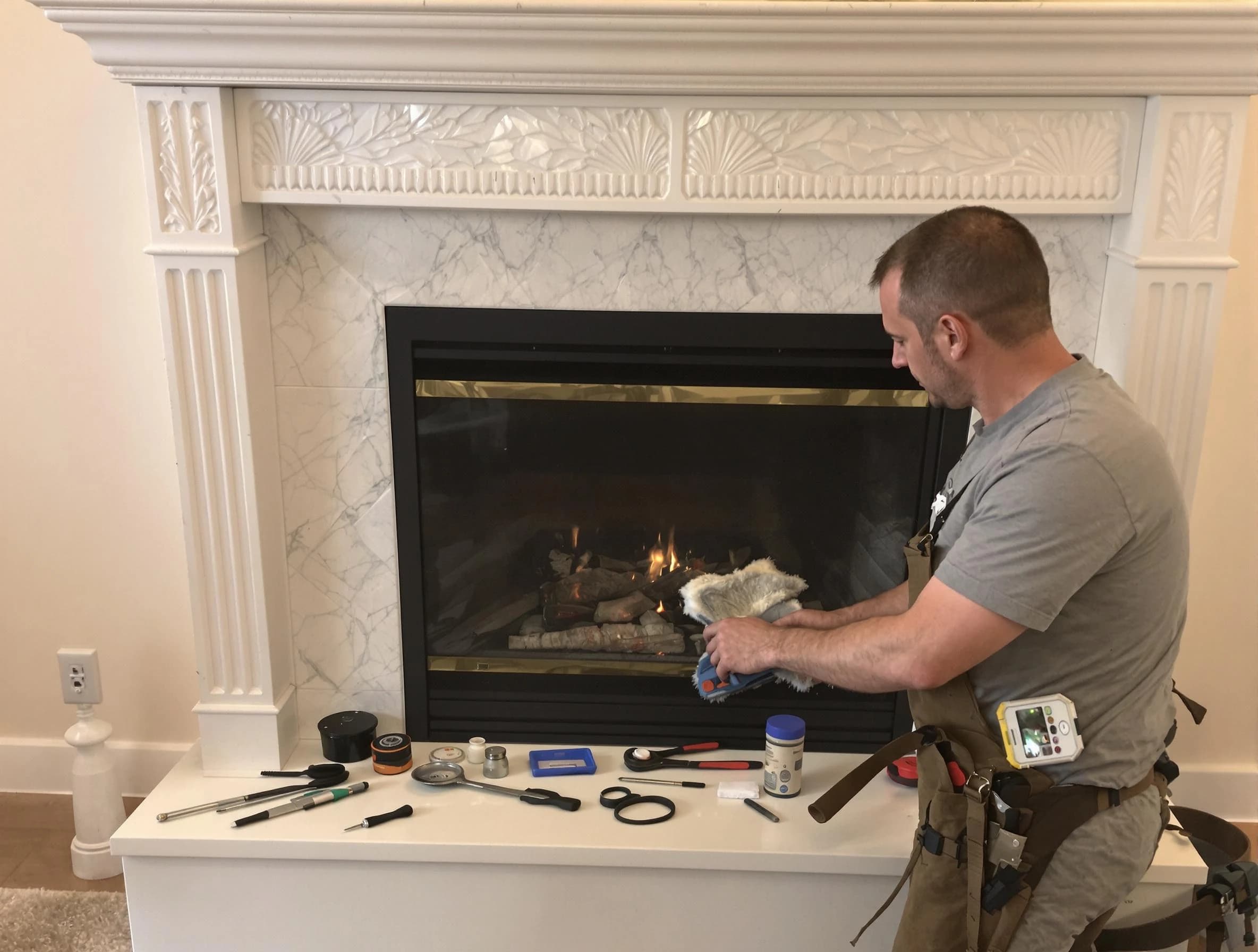 Surprise Chimney Sweep performing fireplace maintenance in Surprise, AZ